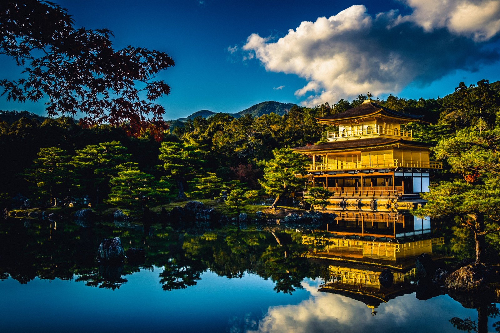 Kinkaku-ji, the Golden Pavilion, reflected in its pond